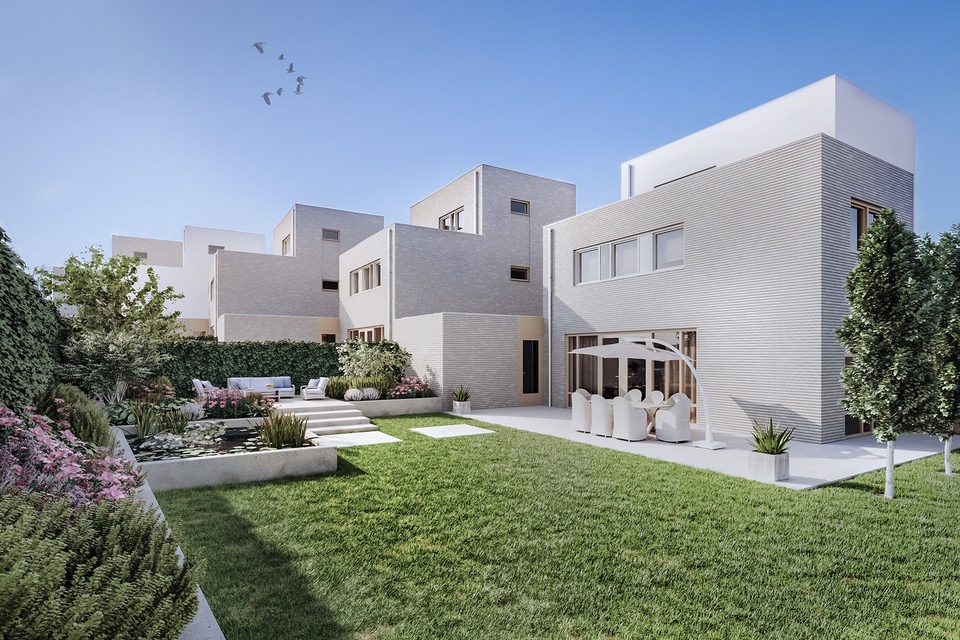 Tuinzijde van de grondgebonden woningen.